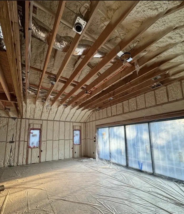 Interior walls and ceiling insulated with spray foam during new construction in Sebastian